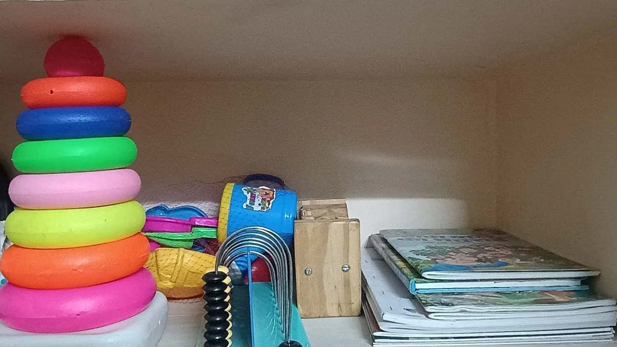 Colourful play-based therapy toys and materials used in child speech therapy sessions
